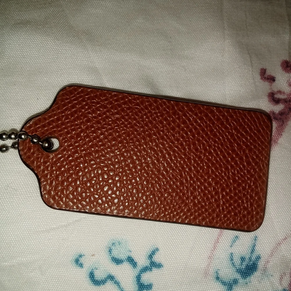 Coach brown hang tag
